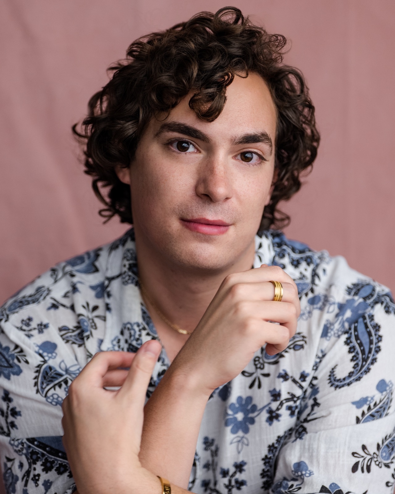 Neil's working-actor headshot in pink/floral shirt